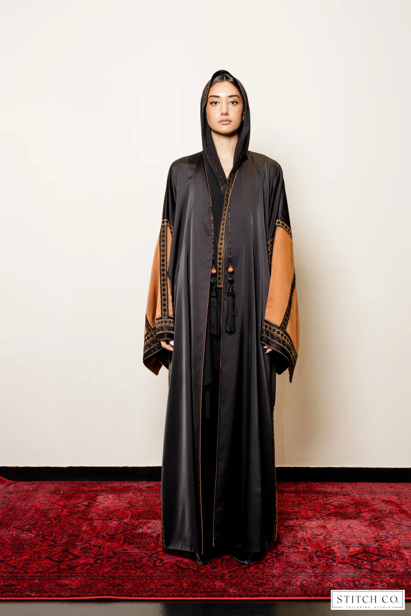 black embroidery  abaya with orange sleeves 